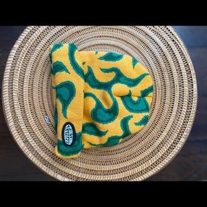 Petals and peacocks knit beanie